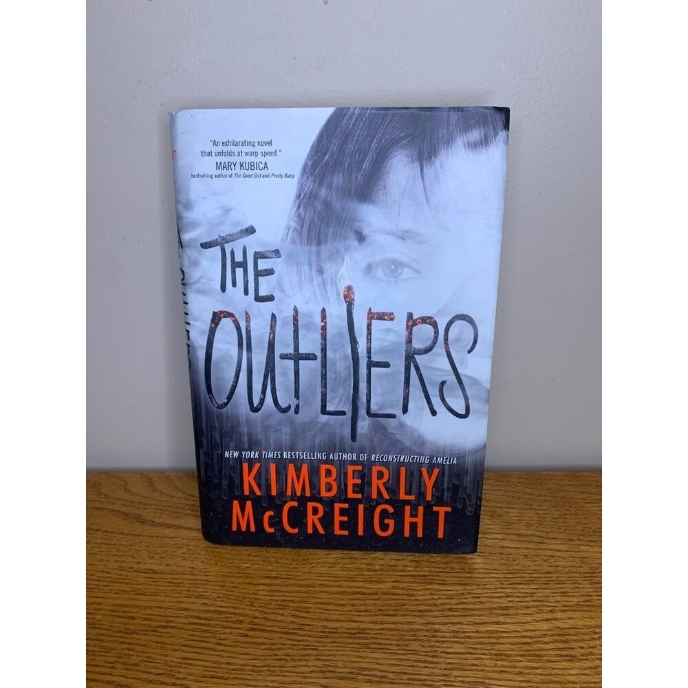 The outliers by Kimberly mcreight signed by author